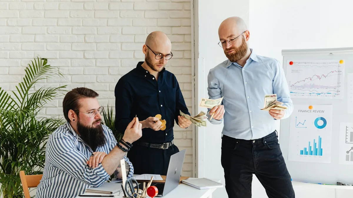 Marketing team reviewing campaign plans